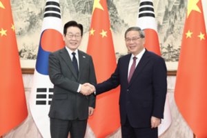 P. Korėjos prezidentas teigia paraginęs Kinijos lyderį padėti pažaboti Š. Korėjos branduolinę programą