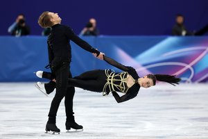 Stebuklingasis olimpinis ledas – širdį atidavę A. Reed ir S. Ambrulevičius Milano žaidynėse užėmė įspūdingą 6-ąją vietą