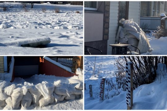 Perspėjus apie galimą potvynį gyventojai skuba ruoštis: prie namų statomos užtvaros