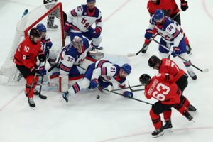 Olimpiniame ledo ritulio finale – JAV triumfas po pratęsimo prieš Kanadą