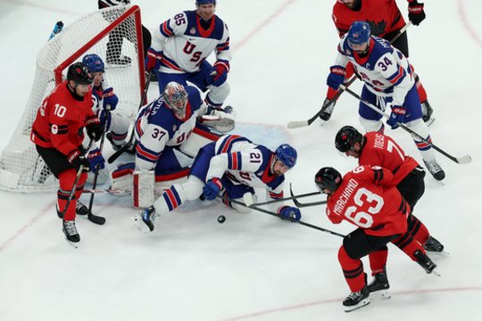 Olimpiniame ledo ritulio finale – JAV triumfas po pratęsimo prieš Kanadą