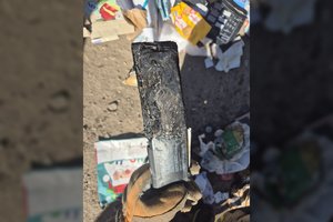 Po incidento šiukšliavėžėje Skuodo ugniagesiai įspėja: niekada taip nedarykite!