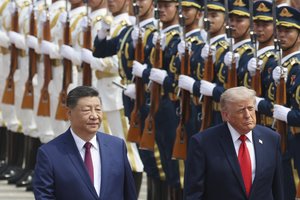 Pompastiškame susitikime – tiesioginis Xi Jinpingo įspėjimas D. Trumpui