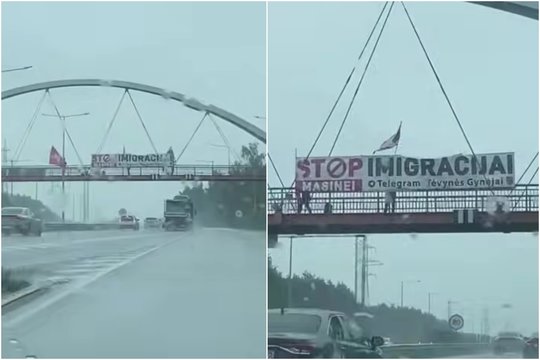 Kaune iškeltas plakatas su užrašu „STOP masinei imigracijai“