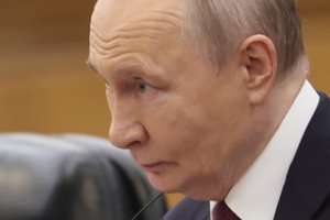 Pekine – smūgis V. Putinui