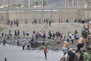 JAV dėl migrantų chaoso kaltina Ispaniją